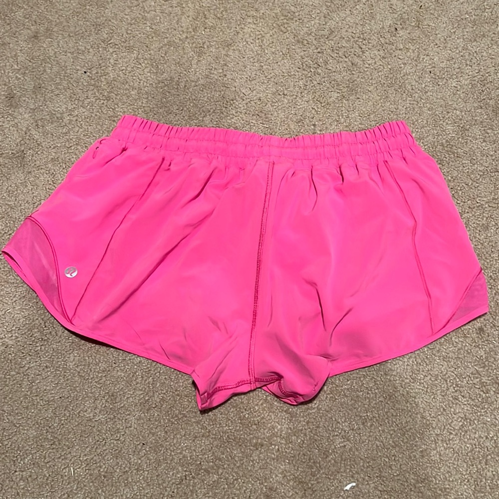 Pink shorts from lululemon and size 10. Barley worn and excellent condition.